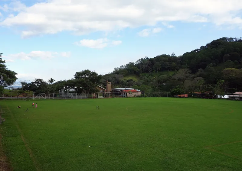 Centre of Barrio Jesús in Atenas canton with a football pitch and church