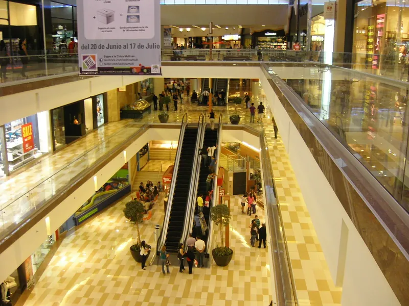 Escalators and shops in the Multiplaza Escazú mall