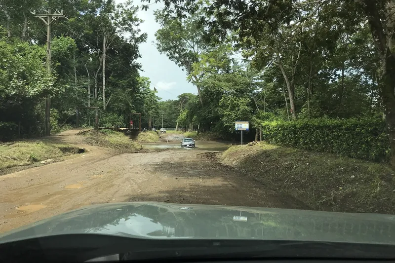 Ford on the unpaved road between Nosara and Ostional, dry in the dry season and often impassable in the rainy season
