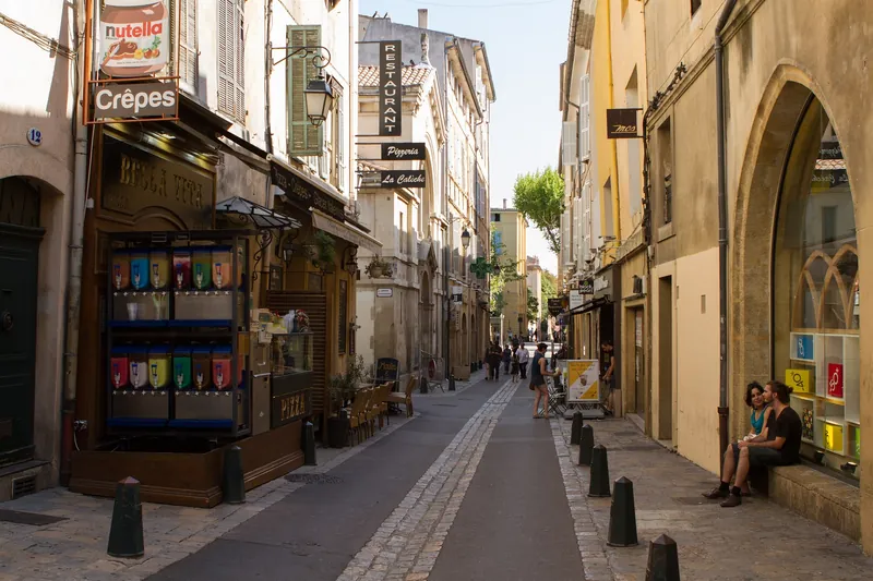 Rue de la Masse in the old town of Aix-en-Provence, with restaurants and a crêperie