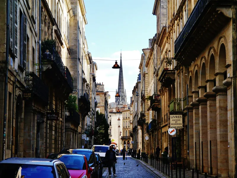 Rue du Chai des Farines in Bordeaux's old town, looking towards the tower of the Basilica of Saint-Michel