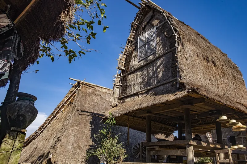 Berugaq (open pavilion) and thatched Sasak houses in Sade village on Lombok