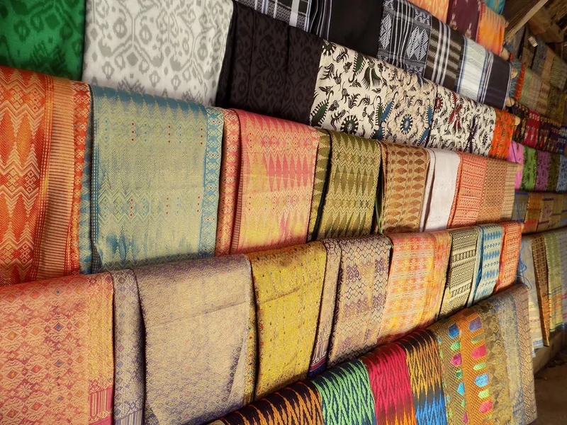 Stacks of handwoven cloth (kain tenun) for sale in Sade village on Lombok