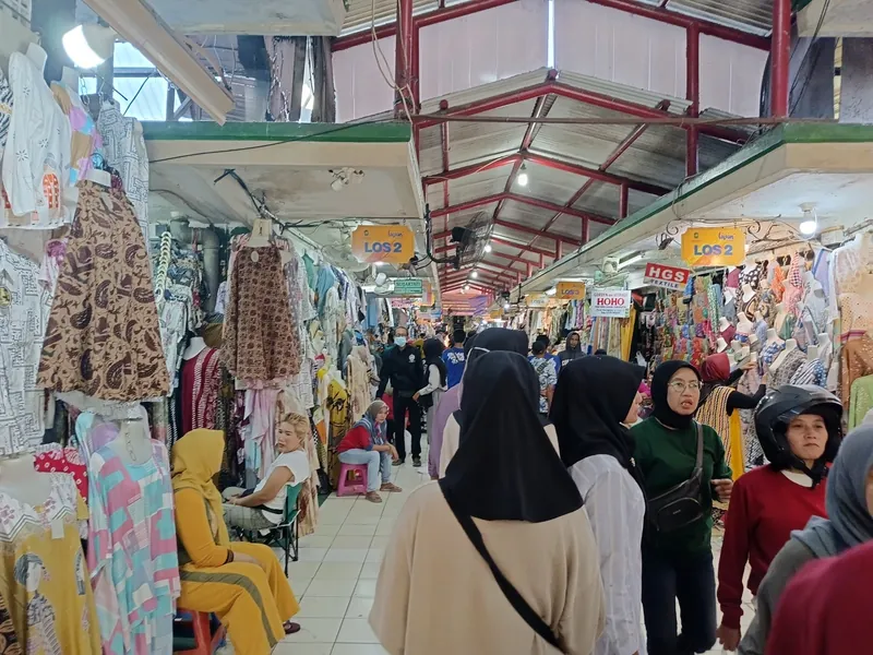 Aisle of clothing stalls in Pasar Beringharjo, Yogyakarta's traditional main market