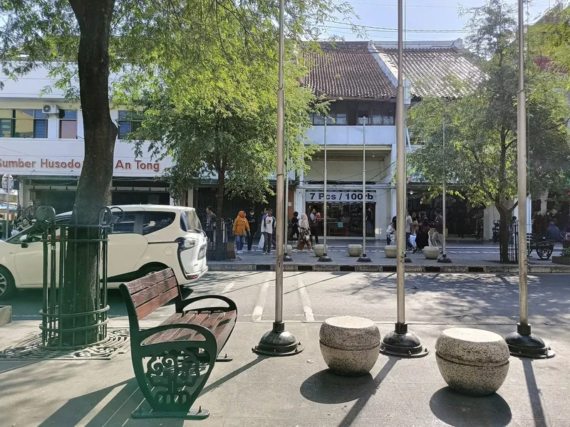 Widened pavement with benches on Malioboro in Yogyakarta in the afternoon