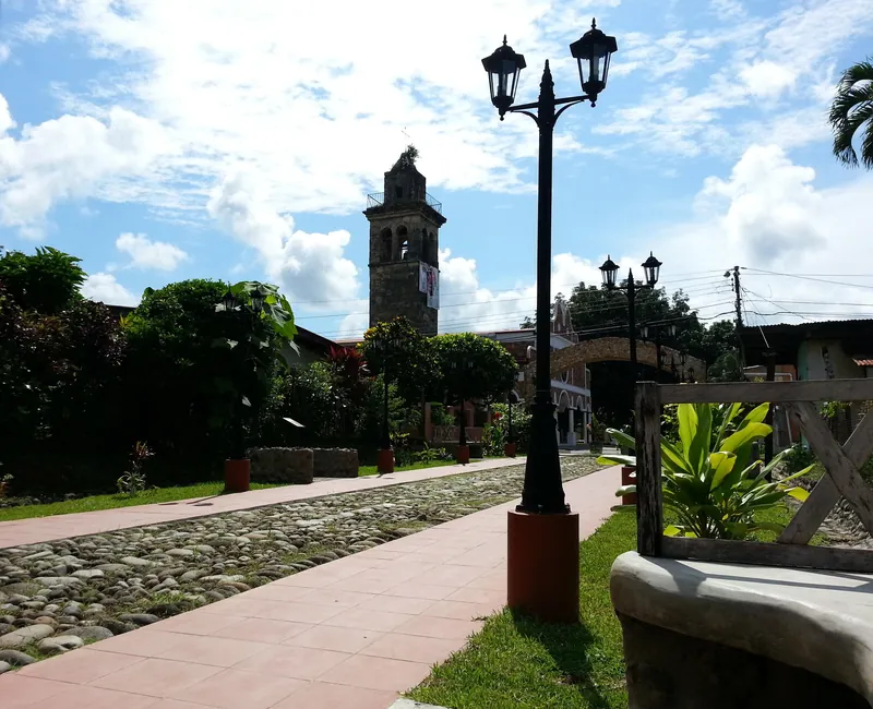 Footpath in central David with the tower of San José Cathedral