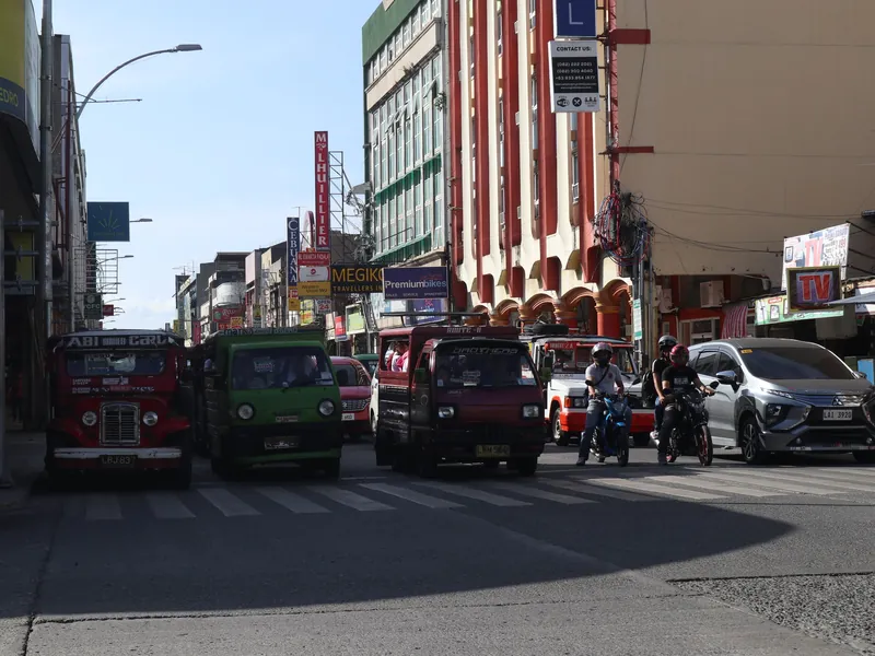 Heavy traffic of jeepneys, motorbikes and cars at the San Pedro–Pelayo junction in central Davao City