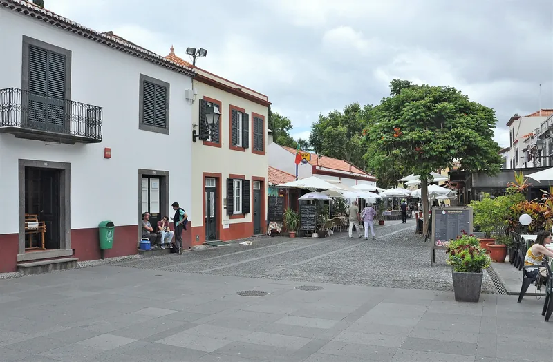 Lane with restaurant terraces in Funchal's old town (Zona Velha), Madeira