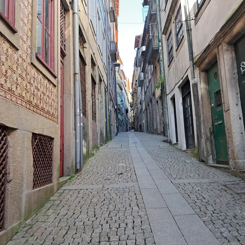 Narrow, steep granite-paved lane in Porto's old town